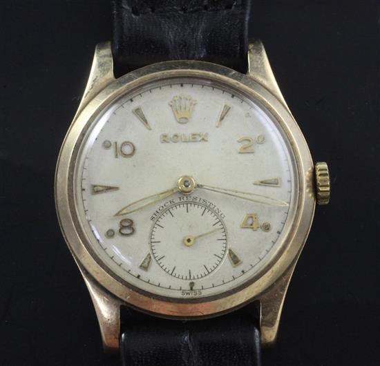 A gentlemans early 1950s 9ct gold mid size Rolex manual wind wrist watch,